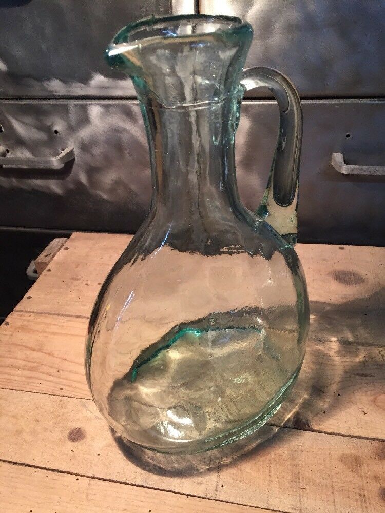 Bluish green glass decanter