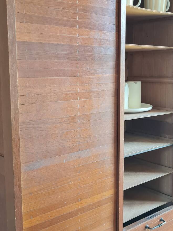 Vintage double curtain filing cabinet.