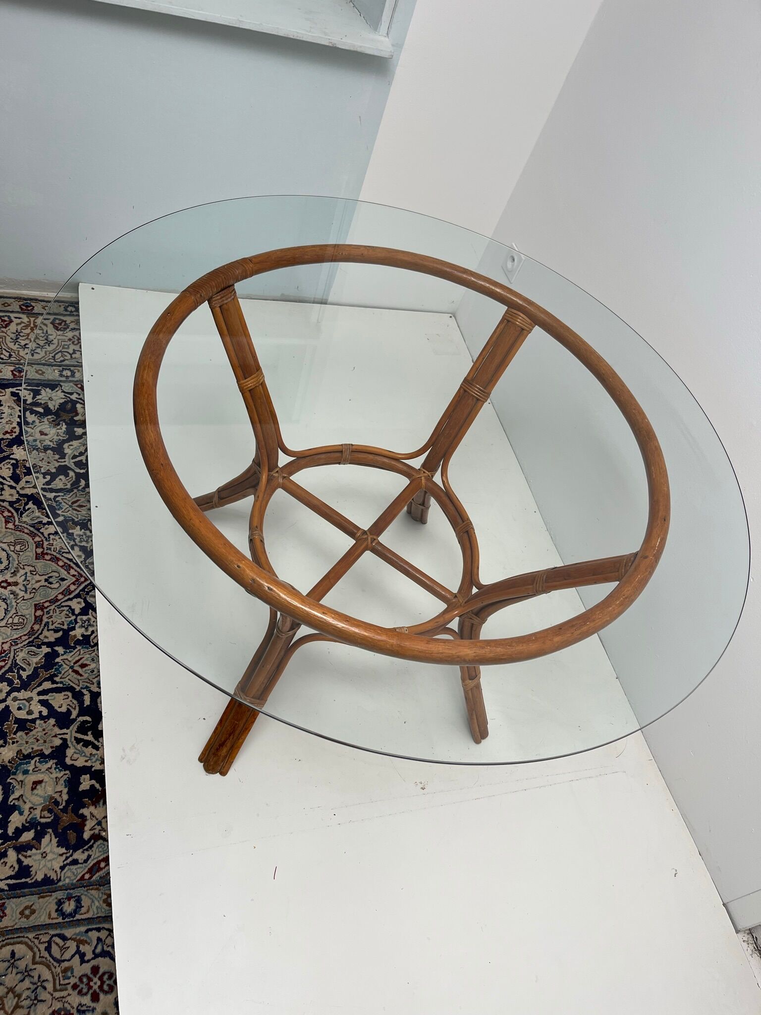 Vintage glass top rattan dining table