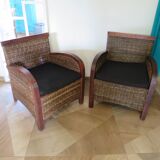 2 colonial-style armchairs in woven rattan and exotic wood