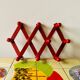 Vintage accordion coat rack in red painted wood