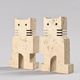 Pair of stylised cats in travertine, Fratelli Manelli, Italy, circa 1970.