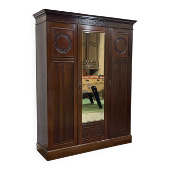 19th-century English mahogany three-door wardrobe.