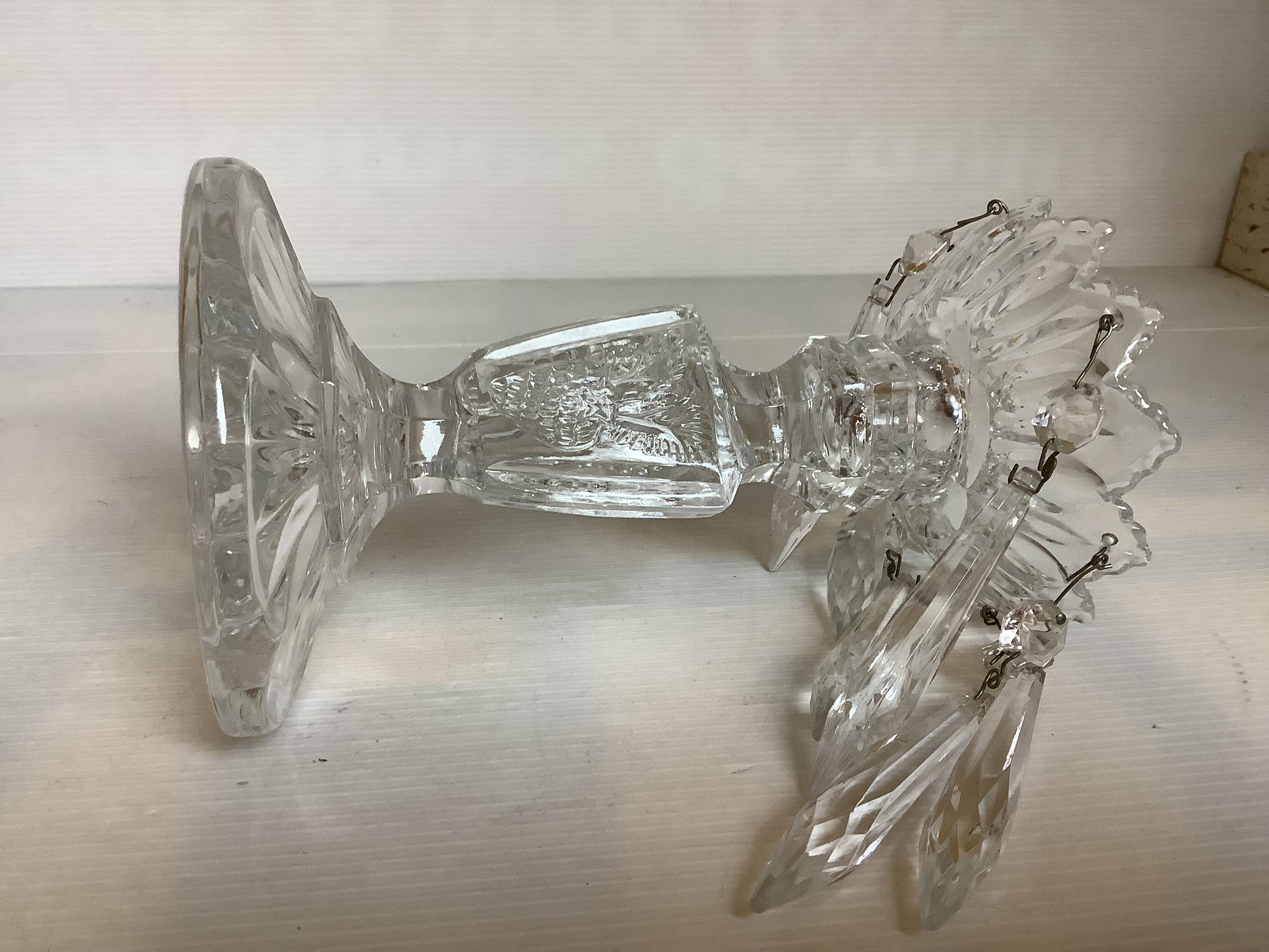 Pineapple candlestick with six glass moulded pendants.