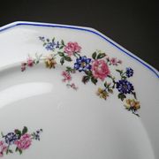 4 flat plates by Bernardaud, Limoges porcelain, floral decoration from the 1920s to 1950s.