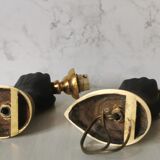 Pair of brass hand flare appliques