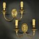 Pair of wall sconces with female masks in Louis XVI style - gilded bronze