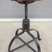 Bienaise stool of the years 1935, model 203 with 4 flat iron cathedral legs joined by a