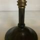 Large candlestick made of sheet metal and brass