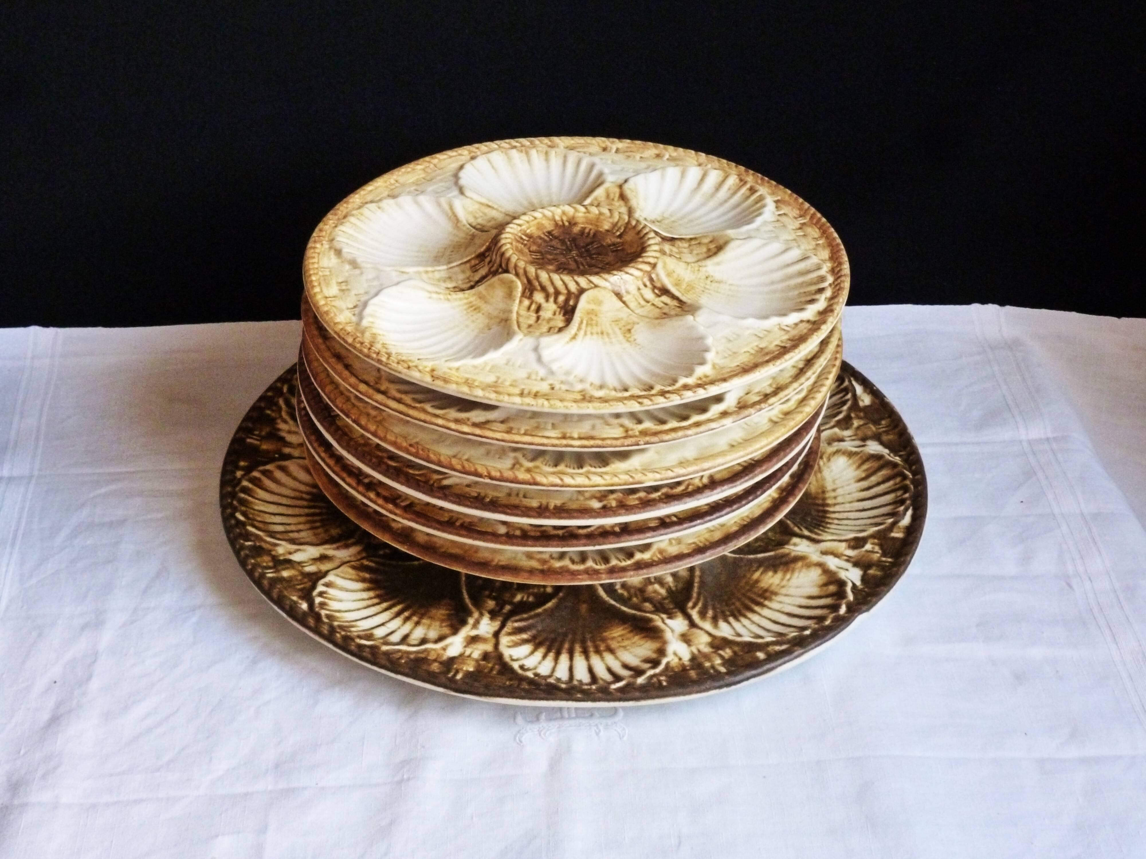 Oyster service, platter and 6 Longchamp oyster plates.