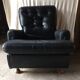 Former black leather chair