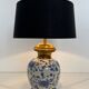 Pair of porcelain lamps with Chinese-style decorations and brass.