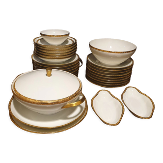 Service d'assiettes en porcelaine dorée à l'or de Limoges XX siècle