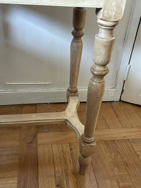 exotic wood console with a drawer