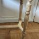 exotic wood console with a drawer