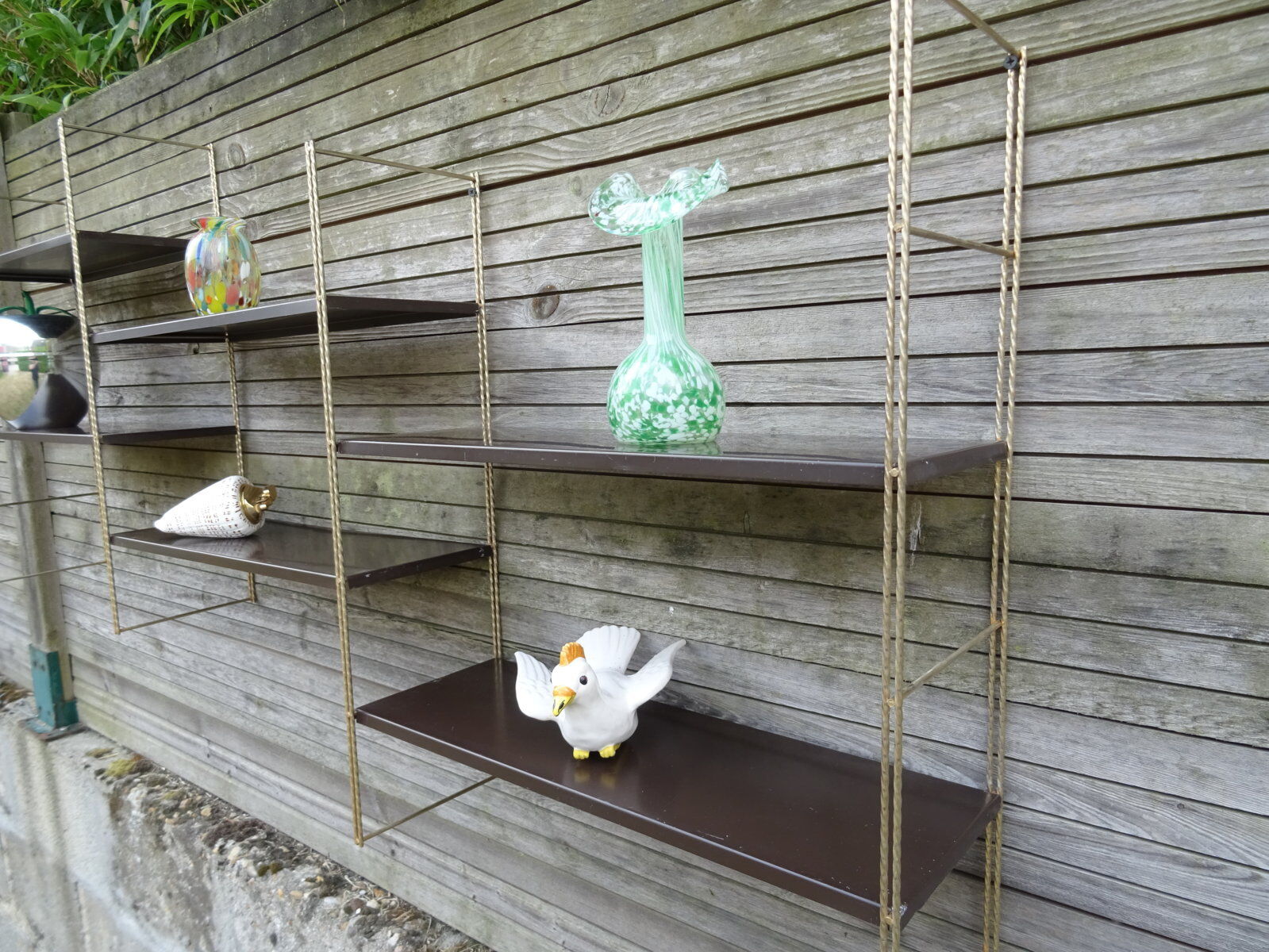Modular metal string wall shelf