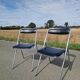 Set of 2 vintage folding chairs by the brand Souvignet.