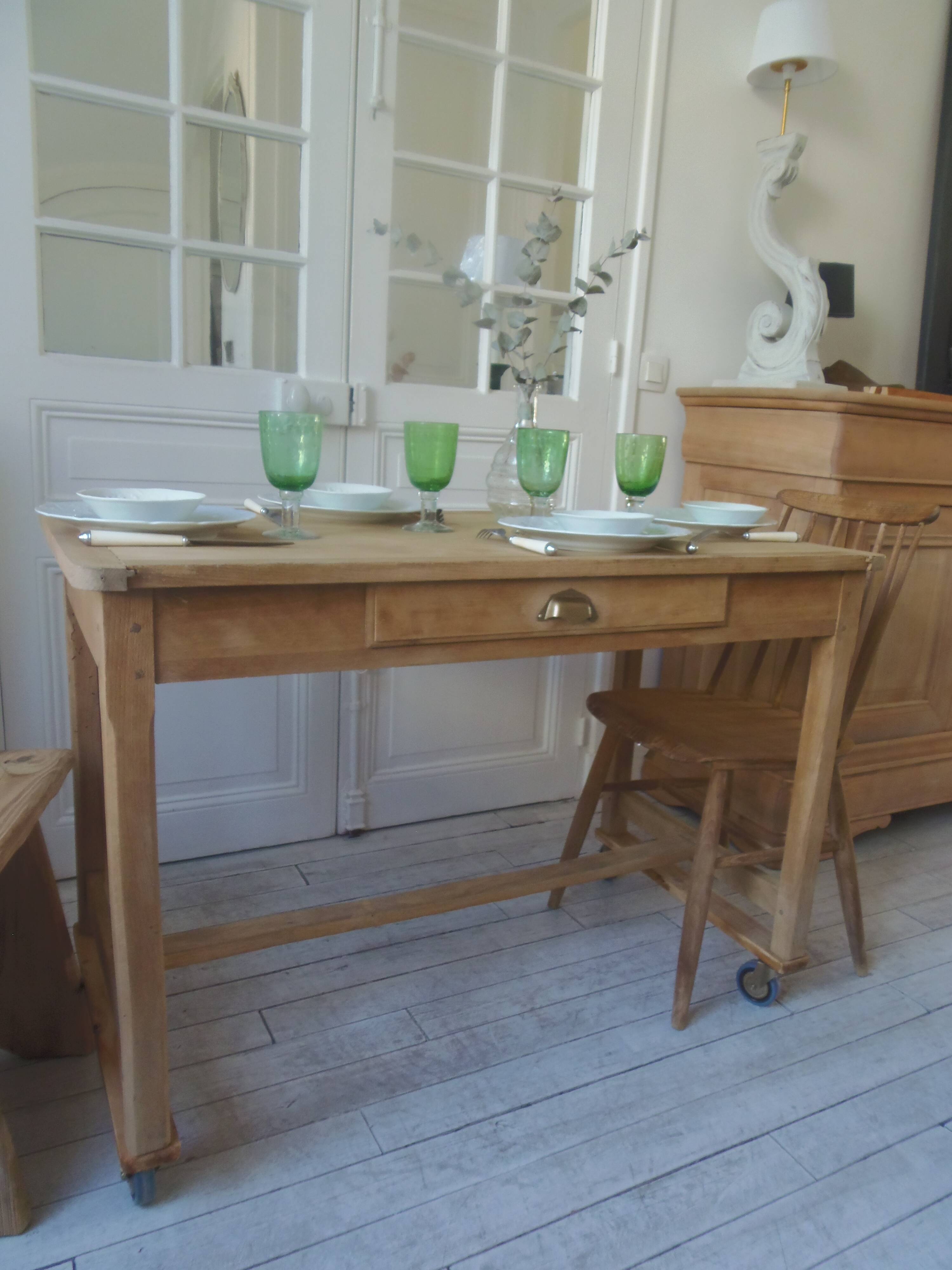 Vintage kitchen table on casters.