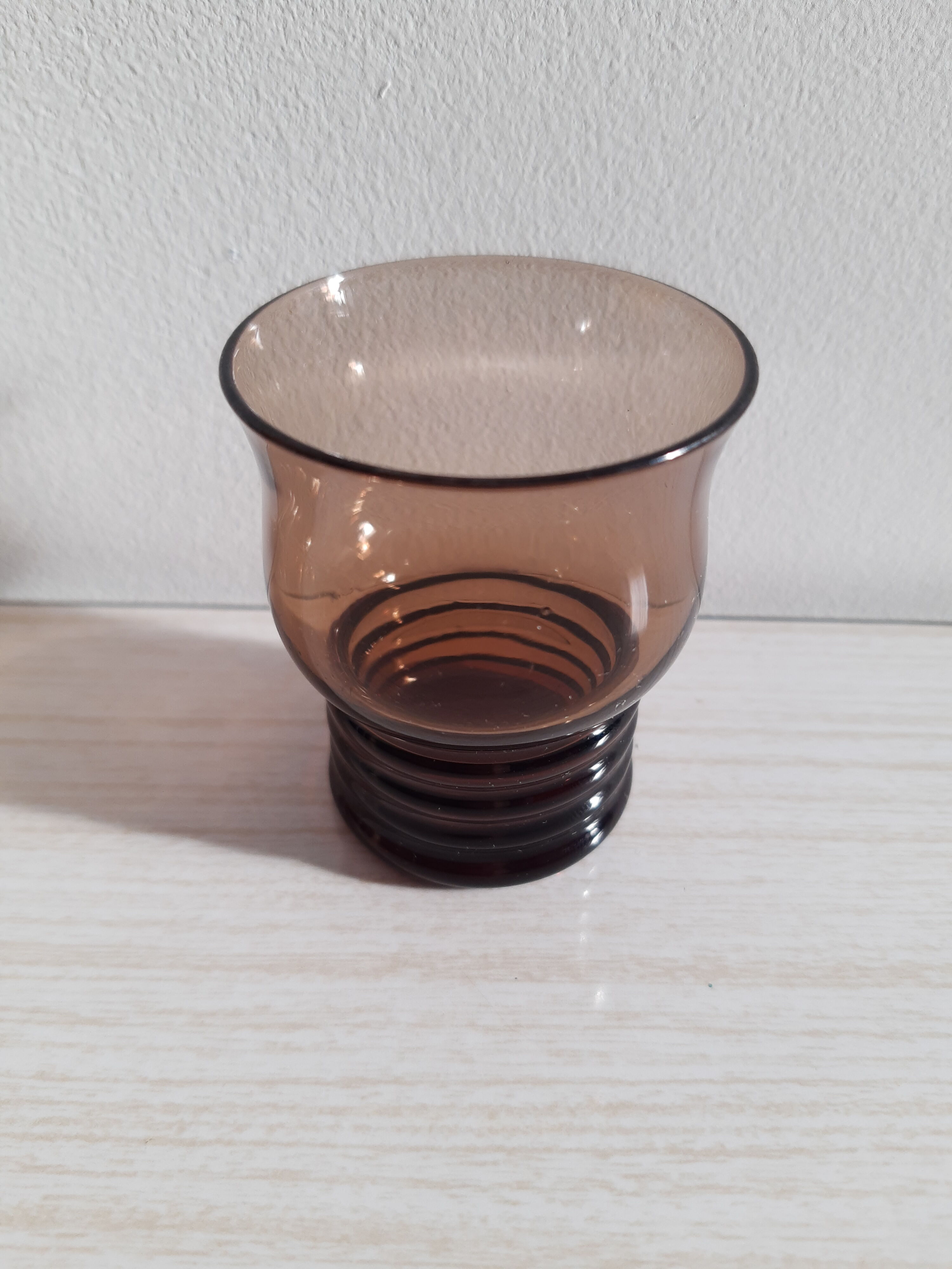 Glasses with vintage liqueur black smoked glass