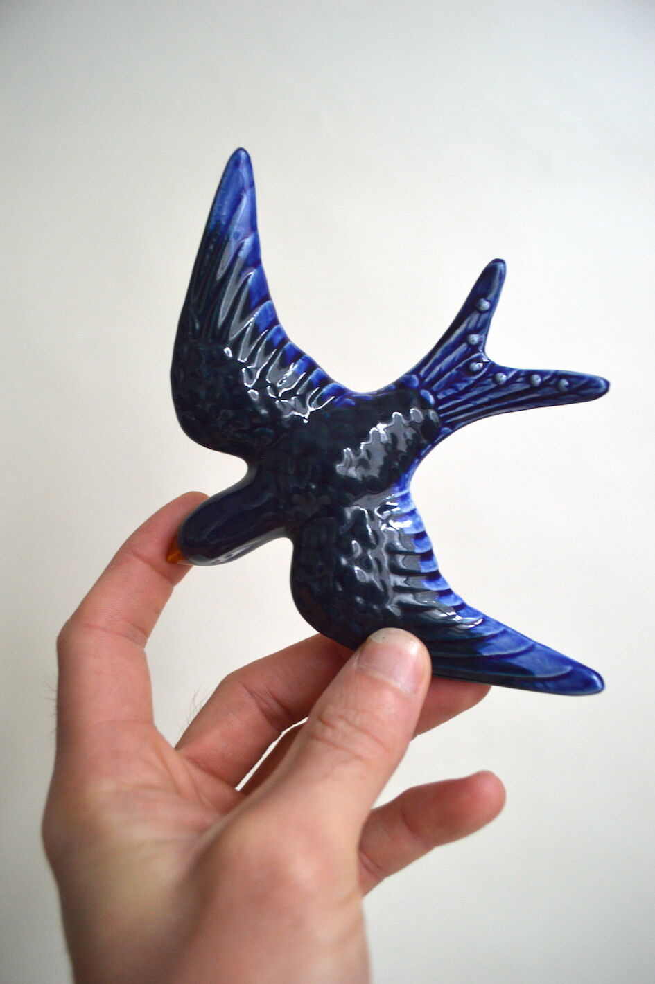 Couple of ceramic wall swallows