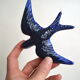 Couple of ceramic wall swallows