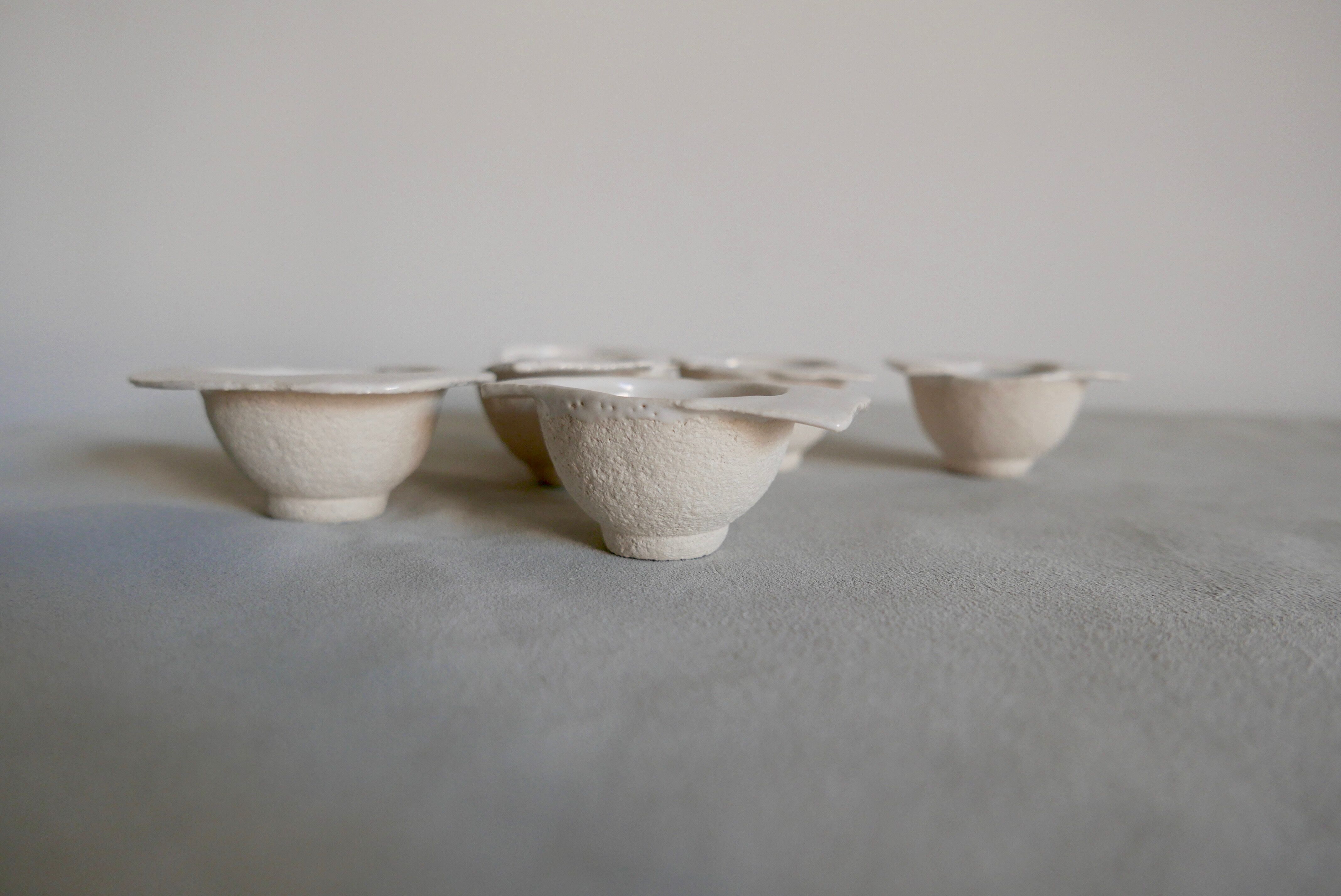 Six white stoneware sake glasses Denise Bresciani ceramics