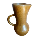 Vintage pitcher with enamelled earth cove