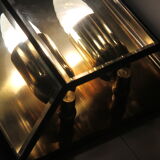 Wall sconce in brass and glass