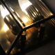 Wall sconce in brass and glass