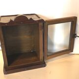 Curiosity showcase in teak