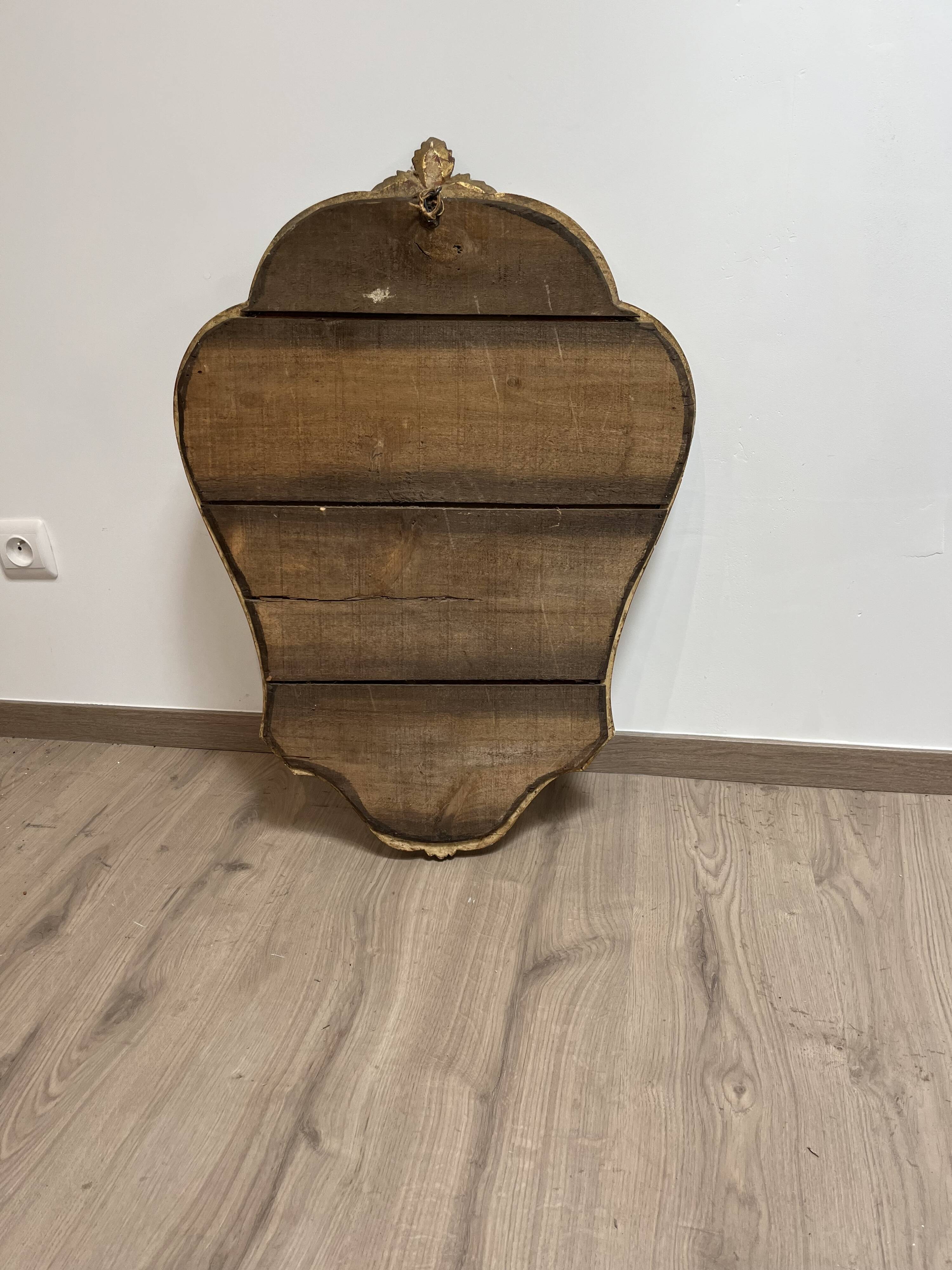 Mirror in wood and gilded stucco, 19th century