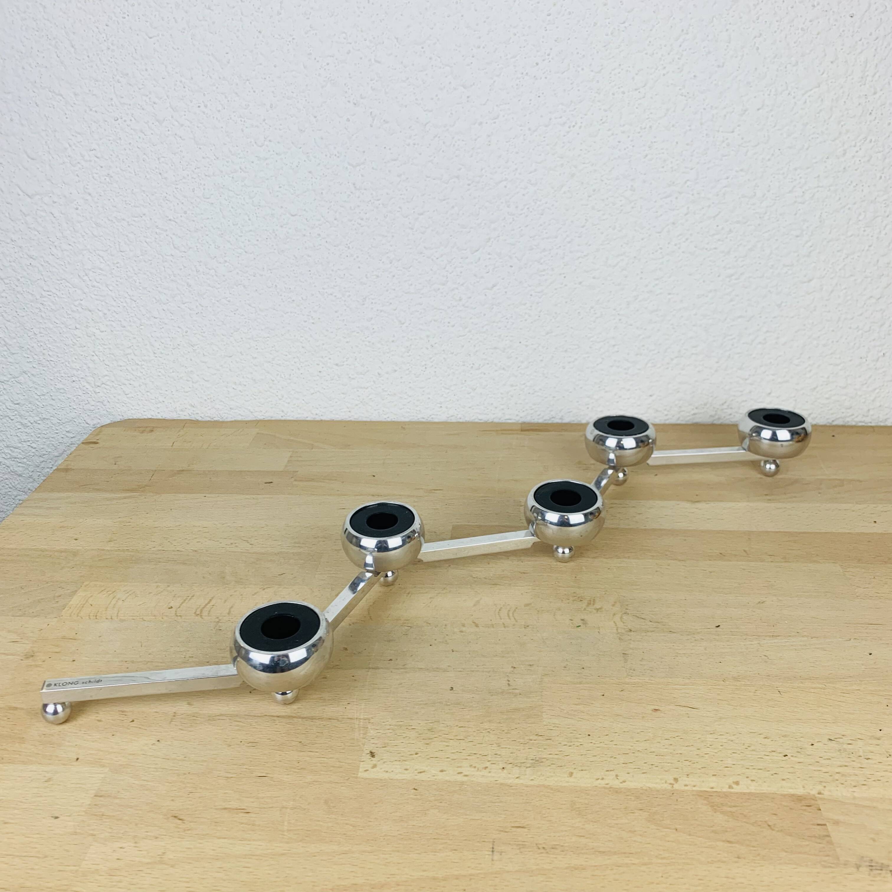 Constella modular candle holder design Klong Schildt chrome