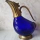 Glass and brass decanter