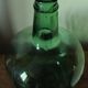 Give me a dark green glass Bonbonne jar.