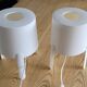 Pair of white Ikea Tvärs bedside lamps