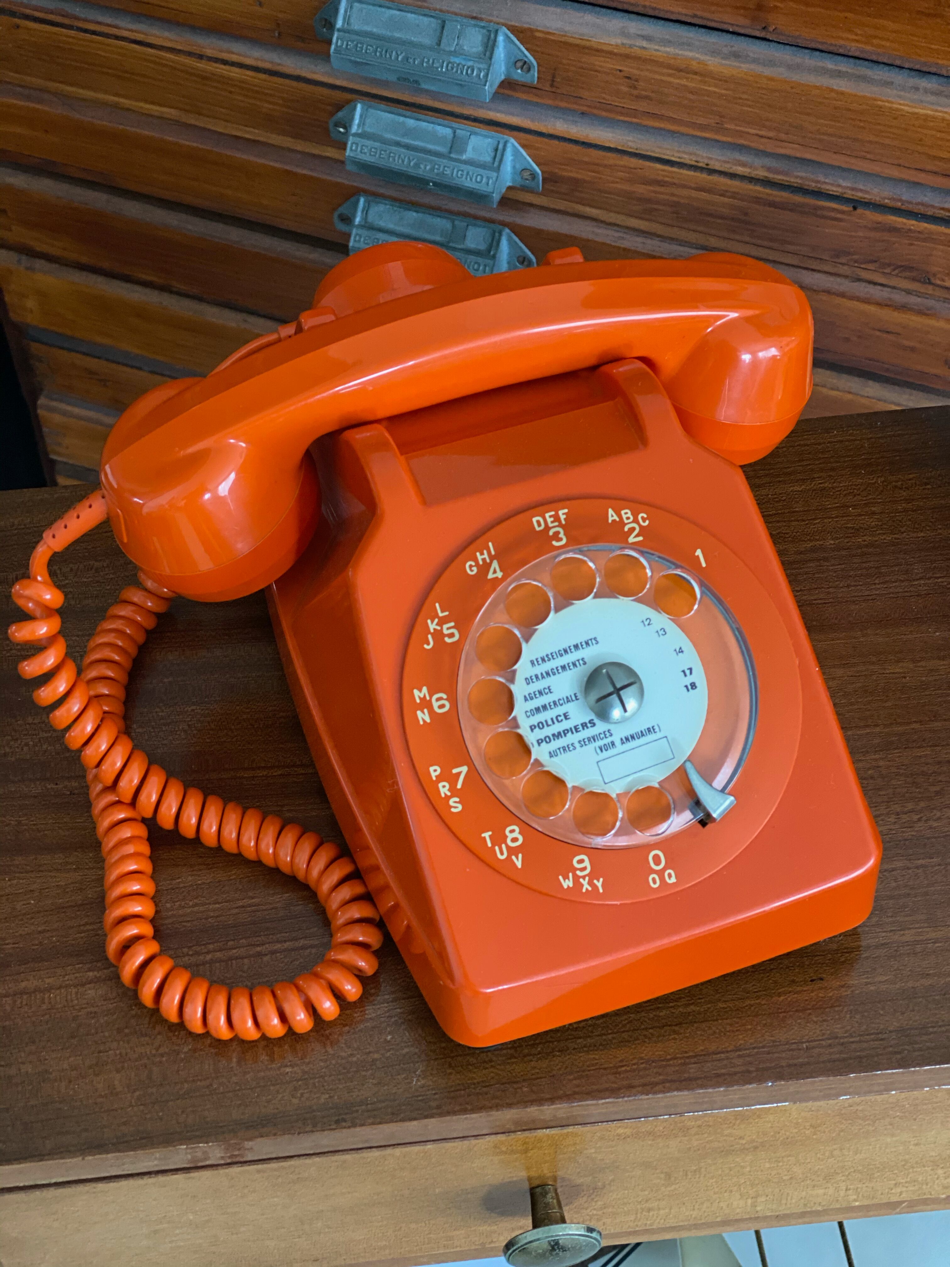 Vintage orange dial phone