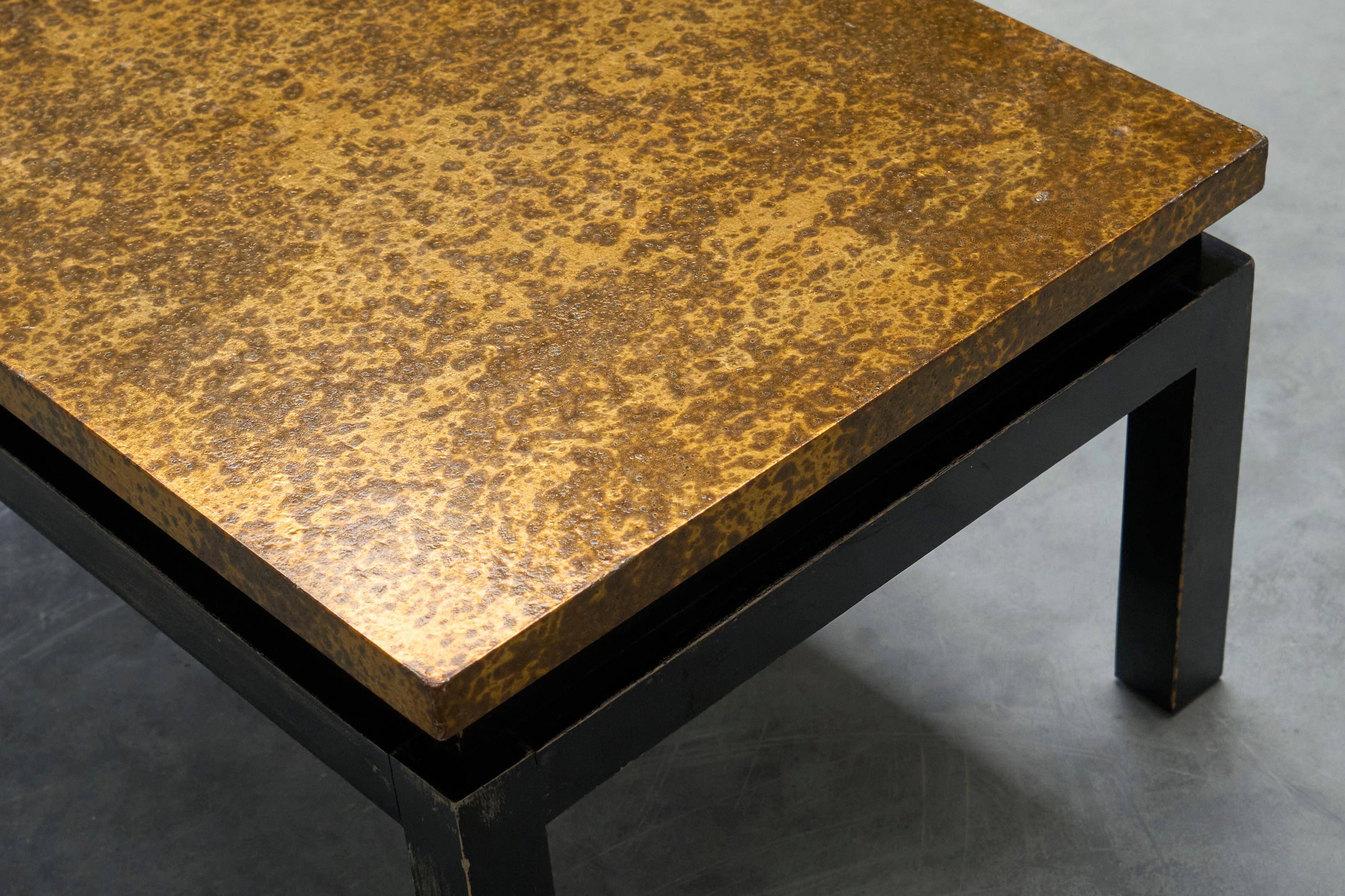 Modernist coffee table with a patinated gold top, 120x52.5x36 cm, mid-20th century.