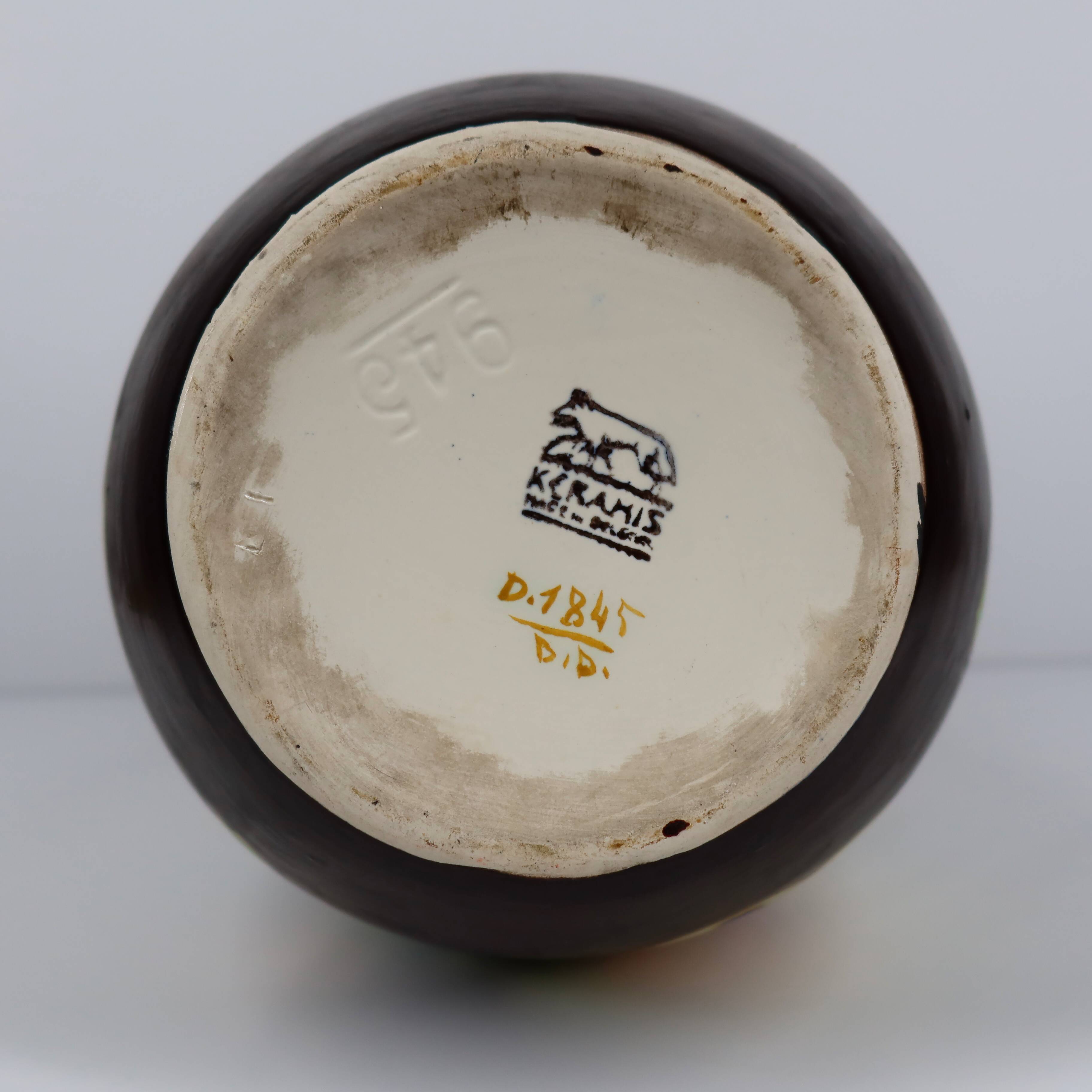 Art Deco vase by Boch Keramis with stylised floral decoration.