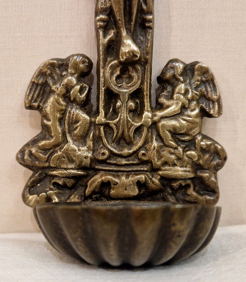 Bronze holy water font from the late 19th century.