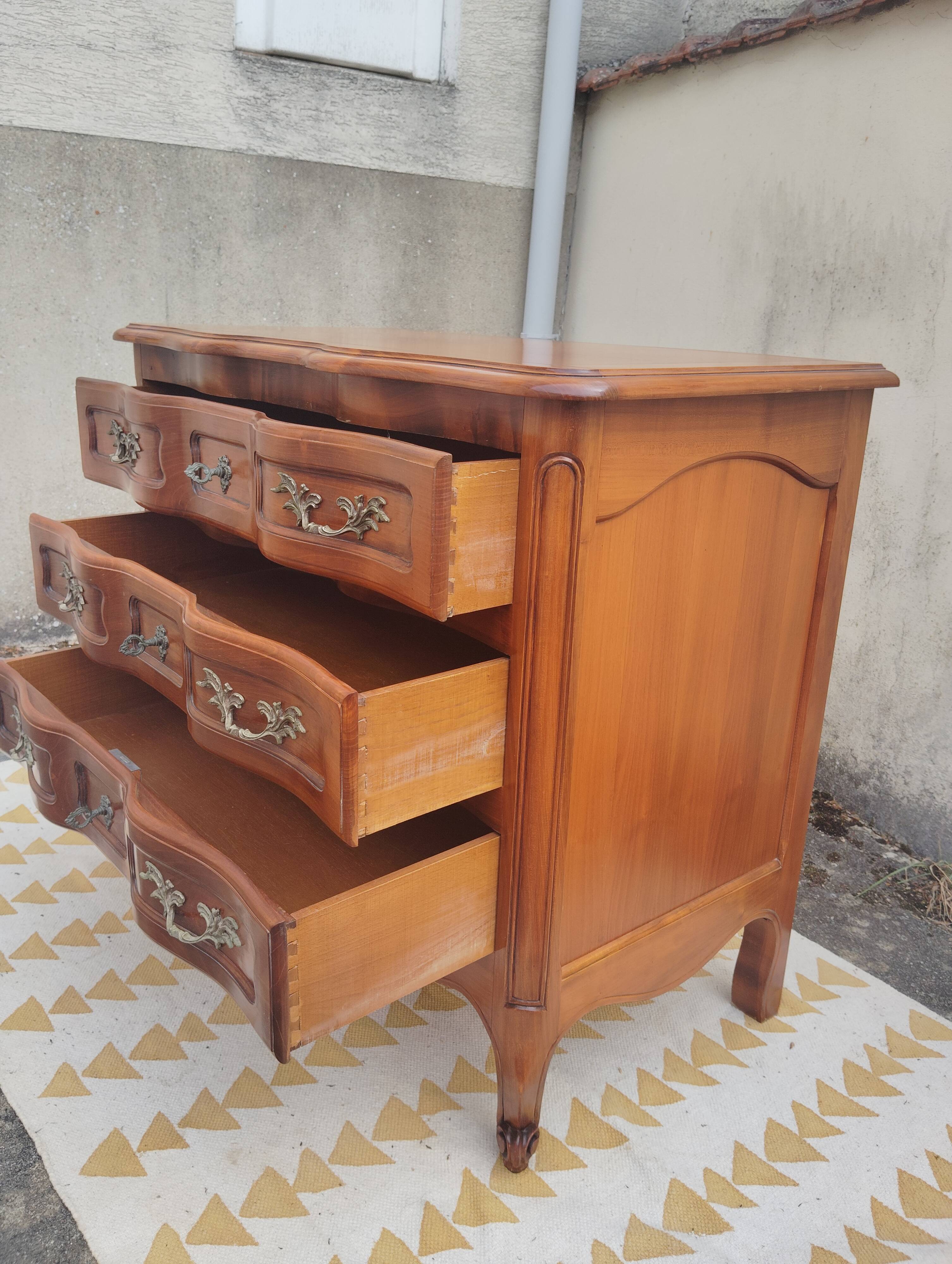 Small cherry crossbow chest of drawers, Regency/Louis XV style