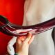 Vintage Murano vase with a red bow