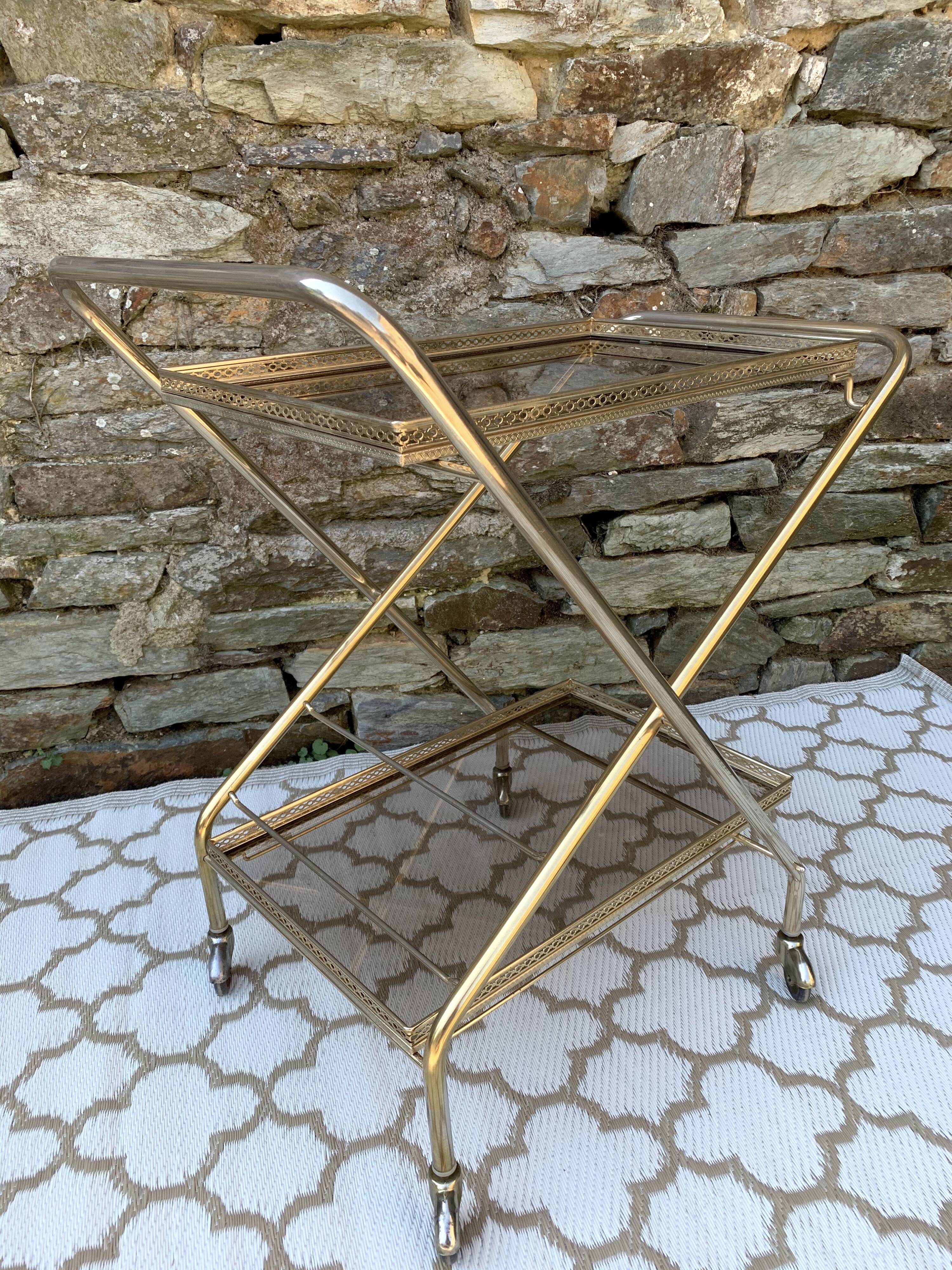 Golden dessert with wheeled glass tray