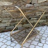 Golden dessert with wheeled glass tray