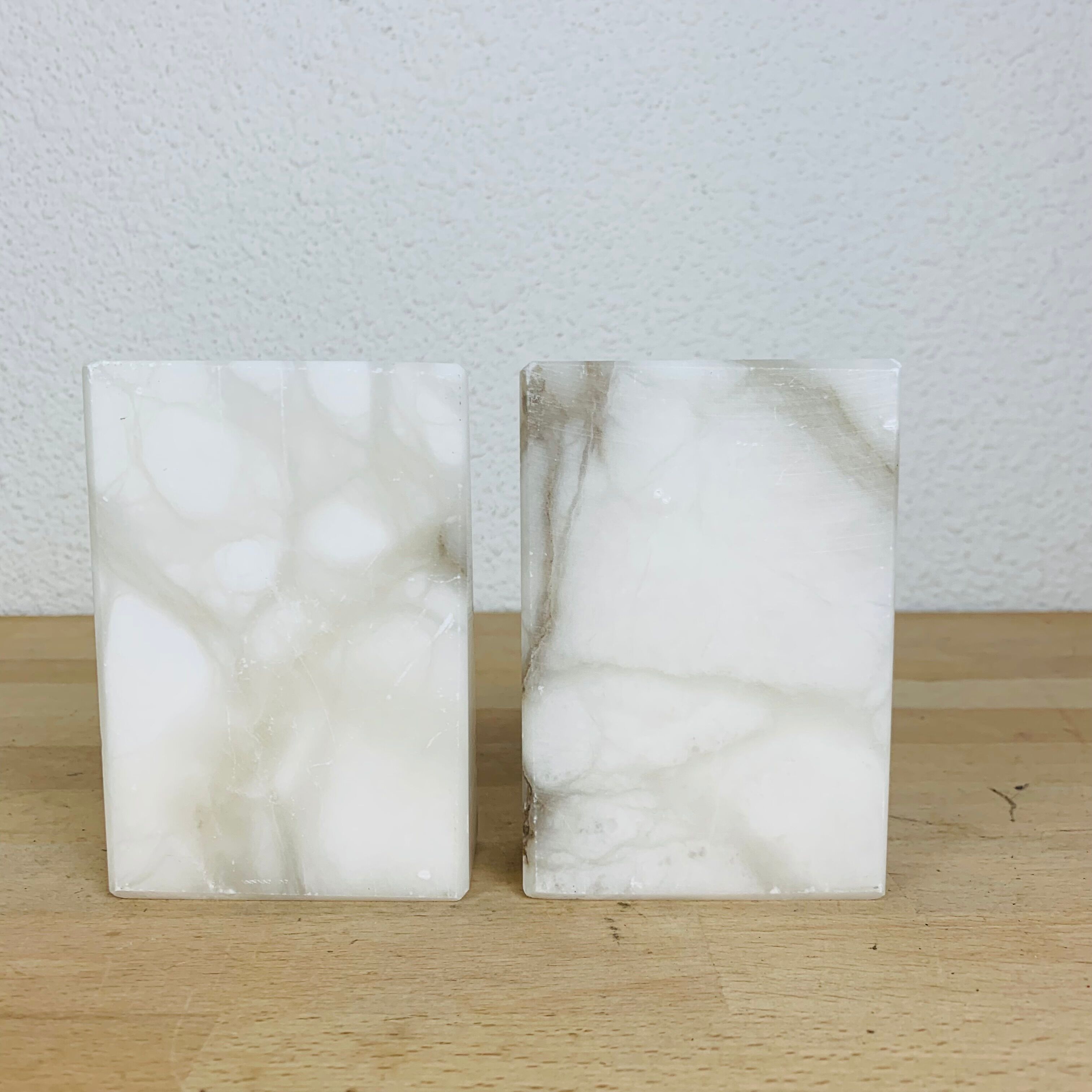 Pair of book greenhouses in alabaster white marble