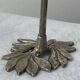 Pair of metal flower candlesticks