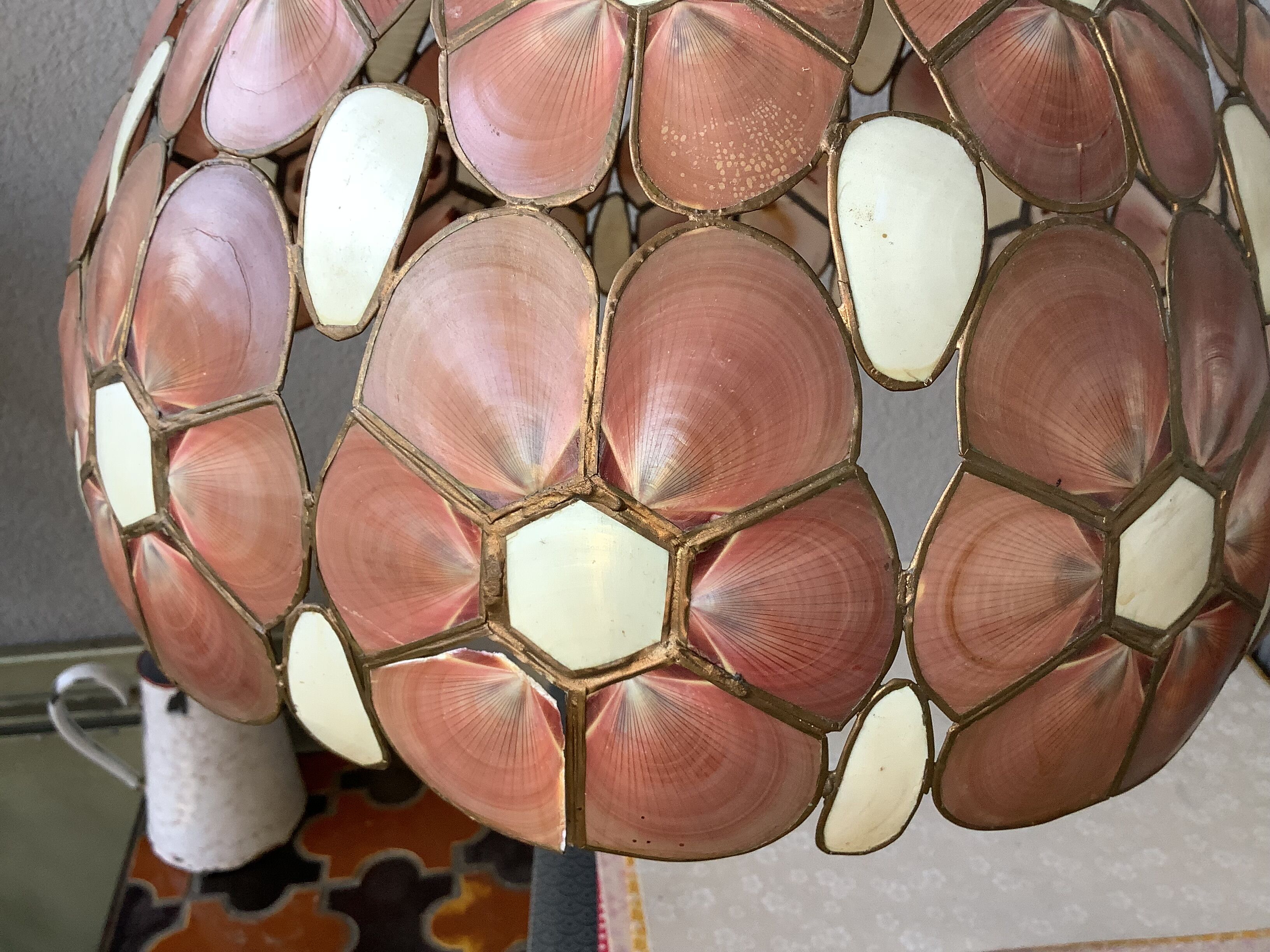 Suspension in mother-of-pearl shell and bohemian brass