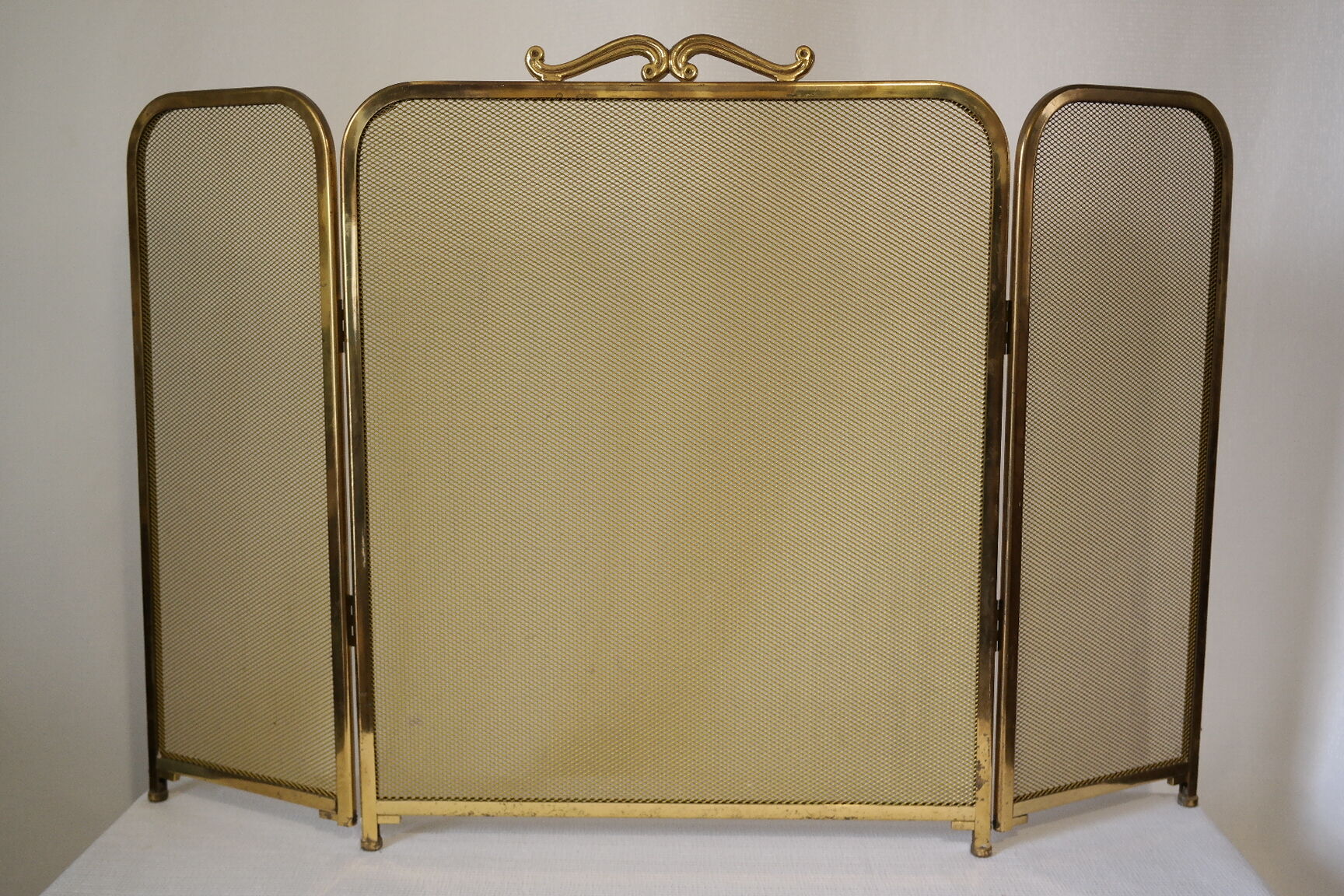 Vintage brass chimney firewall