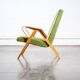 Fauteuil en skaï vert