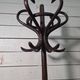 Curved antique wooden parrot