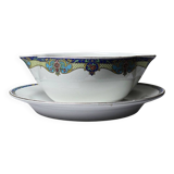 Old Lunéville sauce boat, opaque porcelain with polychrome decoration.